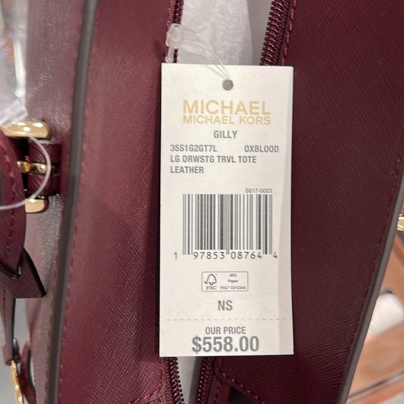 Michael Kors Gilly Large Drawstring Travel Leather Top Zip Tote 
Oxblood Color - Picture 15 of 16